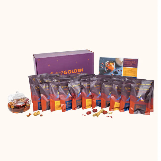 Tea set with 'GOLDEN MONTH' branding on a white background
